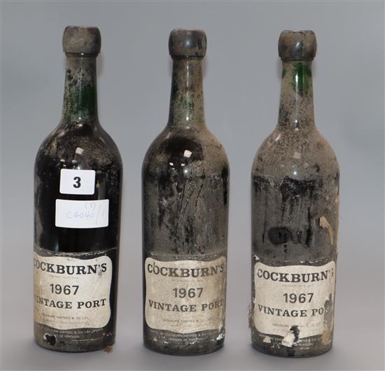 Three bottles of Cockburns vintage port 1967